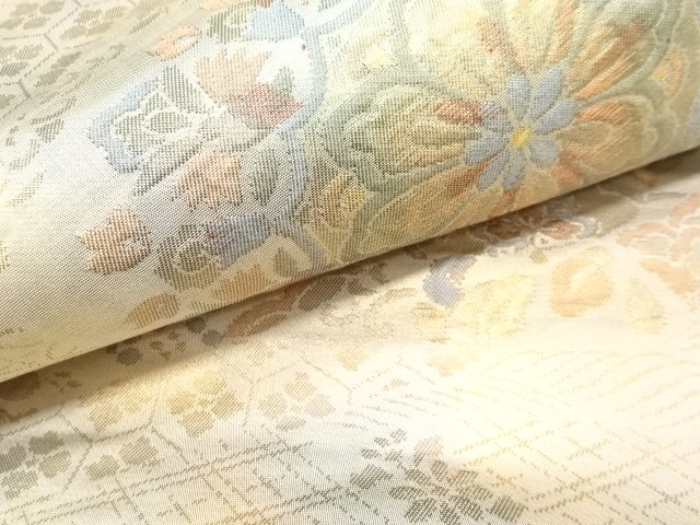  華紋に草花・古典柄織り出し　袋帯